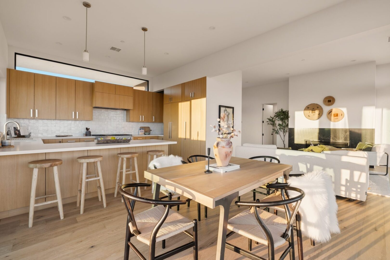 View of the kitchen and dining area with natural light and decor.
